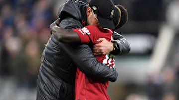 NEWCASTLE UPON TYNE, ENGLAND - MAY 04: Jurgen Klopp, Manager of Liverpool embraces Sadio Mane of Liverpool after the Premier League match between Newcastle United and Liverpool FC at St. James Park on May 04, 2019 in Newcastle upon Tyne, United Kingdom. (Photo by Laurence Griffiths/Getty Images)