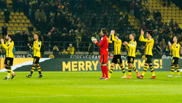 DORTMUND, GERMANY - DECEMBER 20: The team of Borussia Dortmund after the final whistle during the Bundesliga match between Borussia Dortmund and FC Augsburg at Signal Iduna Park on December 20, 2016 in Dortmund, Germany. (Photo by Alexandre Simoes/Borussia Dortmund/Getty Images)