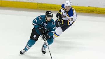 May 25, 2016; San Jose, CA, USA; San Jose Sharks defenseman Marc-Edouard Vlasic (44) and St. Louis Blues left wing Alexander Steen (20) pursue the puck in the third period of game six in the Western Conference Final of the 2016 Stanley Cup Playoffs at SAP Center at San Jose. The Sharks won 5-2. Mandatory Credit: John Hefti-USA TODAY Sports
