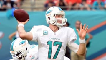 Sep 21, 2014; Miami Gardens, FL, USA; Miami Dolphins quarterback Ryan Tannehill (17) throws a pass against the Kansas City Chiefs at Sun Life Stadium. The Chiefs defeated the Dolphins 34-15. Mandatory Credit: Brad Barr-USA TODAY Sports