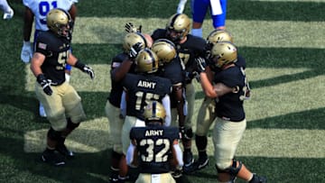 WEST POINT, NEW YORK - SEPTEMBER 05: Sandon McCoy #3 of the Army Black Knights celebrates with teammates after a touchdown run in the first half against the Middle Tennessee Blue Raiders at Michie Stadium on September 5, 2020 in West Point, New York. (Photo by Mike Lawrie/Getty Images)