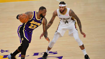 Los Angeles Lakers forward LeBron James (23) moves the against New Orleans Pelicans forward Brandon Ingram Credit: Gary A. Vasquez-USA TODAY Sports