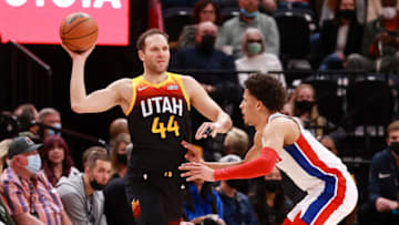 Utah Jazz forward Bojan Bogdanovic (44) passes the ball away from Detroit Pistons guard Cade Cunningham Credit: Chris Nicoll-USA TODAY Sports