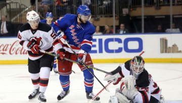 Sep 29, 2016; New York, NY, USA; New Jersey Devils goalie Scott Wedgewood (31) allows a goal to New York Rangers right wing Brandon Pirri (not pictured) in front of New Jersey Devils left wing Blake Pietila (56) and New York Rangers right wing Nicklas Jensen (39) during the third period of a preseason hockey game at Madison Square Garden. Mandatory Credit: Brad Penner-USA TODAY Sports