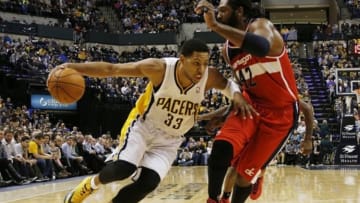 Jan 10, 2014; Indianapolis, IN, USA; Indiana Pacers forward Danny Granger (33) drives to the basket against Washington Wizards center Nene (42) at Bankers Life Fieldhouse. Indiana defeats Washington 93-66. Mandatory Credit: Brian Spurlock-USA TODAY Sports