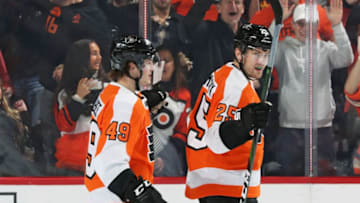 PHILADELPHIA, PA - OCTOBER 26: James van Riemsdyk #25 of the Philadelphia Flyers celebrates his second period power-play goal against the Columbus Blue Jackets with Joel Farabee #49 on October 26, 2019 at the Wells Fargo Center in Philadelphia, Pennsylvania. (Photo by Len Redkoles/NHLI via Getty Images)