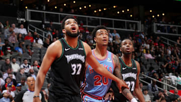 ATLANTA, GA - FEBRUARY 27: Karl-Anthony Towns #32 of the Minnesota Timberwolves and John Collins #20 of the Atlanta Hawks. Copyright 2019 NBAE (Photo by Jasear Thompson/NBAE via Getty Images)