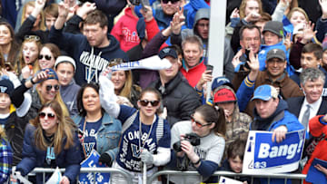 PHILADELPHIA, PA - APRIL 08: Fans cheer along Market Street during the Villanova Wildcats Championship Parade on April 8, 2016 in Philadelphia, Pennsylvania. (Photo by Drew Hallowell/Getty Images)