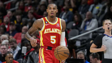 Oct 19, 2022; Atlanta, Georgia, USA; Atlanta Hawks guard Dejounte Murray (5) brings the ball up the court against the Houston Rockets during the second half at State Farm Arena. Mandatory Credit: Dale Zanine-USA TODAY Sports