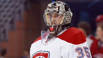 Mar 31, 2016; Tampa, FL, USA; Montreal Canadiens goalie Charlie Lindgren (35) looks on from the ice prior to the game against the Tampa Bay Lightning at Amalie Arena. Mandatory Credit: Kim Klement-USA TODAY Sports