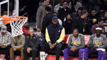LOS ANGELES, CA - MARCH 03: LeBron James #6 of the Los Angeles Lakers watches the action from the bench during the first half against Minnesota Timberwolves at Crypto.com Arena on March 3, 2023 in Los Angeles, California. (Photo by Kevork Djansezian/Getty Images)