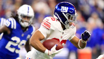 INDIANAPOLIS, INDIANA - DECEMBER 23: Saquon Barkley #26 of the New York Giants runs the ball in the game against the Indianapolis Colts in the first quarter at Lucas Oil Stadium on December 23, 2018 in Indianapolis, Indiana. (Photo by Andy Lyons/Getty Images)
