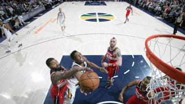 SALT LAKE CITY, UT - DECEMBER 4: Donovan Mitchell #45 of the Utah Jazz goes to the basket against the Washington Wizards on December 4, 2017 at Vivint Smart Home Arena in Salt Lake City, Utah. NOTE TO USER: User expressly acknowledges and agrees that, by downloading and/or using this photograph, user is consenting to the terms and conditions of the Getty Images License Agreement. Mandatory Copyright Notice: Copyright 2017 NBAE (Photo by Melissa Majchrzak/NBAE via Getty Images)