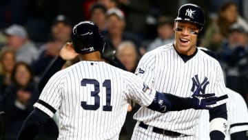 NEW YORK, NEW YORK - OCTOBER 18: Aaron Hicks #31 of the New York Yankees celebrates with Aaron Judge #99 after hitting a three run home run against Justin Verlander #35 of the Houston Astros during the first inning in game five of the American League Championship Series at Yankee Stadium on October 18, 2019 in New York City. (Photo by Mike Stobe/Getty Images)