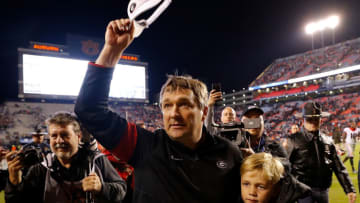 AUBURN, ALABAMA - NOVEMBER 16: Head coach Kirby Smart of the Georgia Bulldogs celebrates their 21-14 win over the Auburn Tigers with his son Andrew at Jordan-Hare Stadium on November 16, 2019 in Auburn, Alabama. (Photo by Kevin C. Cox/Getty Images)
