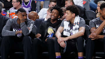 SACRAMENTO, CA - MARCH 9: Iman Shumpert #4, De'Aaron Fox #5 and Justin Jackson #25 of the Sacramento Kings look on during the game against the Orlando Magic on March 9, 2018 at Golden 1 Center in Sacramento, California. NOTE TO USER: User expressly acknowledges and agrees that, by downloading and or using this photograph, User is consenting to the terms and conditions of the Getty Images Agreement. Mandatory Copyright Notice: Copyright 2018 NBAE (Photo by Rocky Widner/NBAE via Getty Images)
