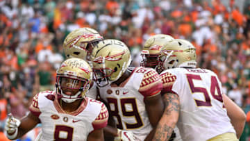 MIAMI, FL - OCTOBER 06: Florida State Seminoles celebrate a touchdown by Nyqwan Murray #8 of the Florida State Seminoles in the first half against the Florida State Seminoles at Hard Rock Stadium on October 6, 2018 in Miami, Florida. (Photo by Mark Brown/Getty Images)