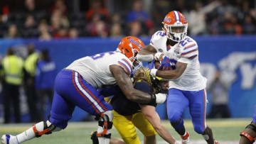 ATLANTA, GEORGIA - DECEMBER 29: Lamical Perine #22 of the Florida Gators runs for a fourth quarter touchdown against the Michigan Wolverines during the Chick-fil-A Peach Bowl at Mercedes-Benz Stadium on December 29, 2018 in Atlanta, Georgia. (Photo by Joe Robbins/Getty Images)