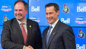 May 9, 2016; Ottawa, Ontario, CAN; Ottawa Senators general manager Pierre Dorion and new head coach Guy Boucher shake hands at a press conference at the Canadian Tire Centre. Mandatory Credit: Marc DesRosiers-USA TODAY Sports
