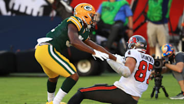 TAMPA, FLORIDA - OCTOBER 18: Rob Gronkowski #87 of the Tampa Bay Buccaneers catches a touchdown pass against Adrian Amos #31 of the Green Bay Packers during the second quarter at Raymond James Stadium on October 18, 2020 in Tampa, Florida. (Photo by Mike Ehrmann/Getty Images)