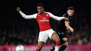 LONDON, ENGLAND - DECEMBER 19: Joseph Willock of Arsenal battles with Aaron Cresswell of West Ham United during the Carabao Cup Quarter-Final match between Arsenal and West Ham United at Emirates Stadium on December 19, 2017 in London, England. (Photo by Shaun Botterill/Getty Images)