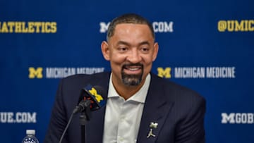 ANN ARBOR, MICHIGAN - DECEMBER 06: Head Basketball Coach Juwan Howard of the Michigan Wolverines addresses the media at the post game press conference after a college basketball game against the Iowa Hawkeyes at Crisler Arena on December 6, 2019 in Ann Arbor, Michigan. The Michigan Wolverines won the game 103-91 over the Iowa Hawkeyes. (Photo by Aaron J. Thornton/Getty Images)