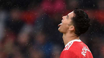Manchester United's Portuguese striker Cristiano Ronaldo reacts during the English Premier League football match between Manchester United and Southampton at Old Trafford in Manchester, north west England, on February 12, 2022. - RESTRICTED TO EDITORIAL USE. No use with unauthorized audio, video, data, fixture lists, club/league logos or 'live' services. Online in-match use limited to 120 images. An additional 40 images may be used in extra time. No video emulation. Social media in-match use limited to 120 images. An additional 40 images may be used in extra time. No use in betting publications, games or single club/league/player publications. (Photo by Oli SCARFF / AFP) / RESTRICTED TO EDITORIAL USE. No use with unauthorized audio, video, data, fixture lists, club/league logos or 'live' services. Online in-match use limited to 120 images. An additional 40 images may be used in extra time. No video emulation. Social media in-match use limited to 120 images. An additional 40 images may be used in extra time. No use in betting publications, games or single club/league/player publications. / RESTRICTED TO EDITORIAL USE. No use with unauthorized audio, video, data, fixture lists, club/league logos or 'live' services. Online in-match use limited to 120 images. An additional 40 images may be used in extra time. No video emulation. Social media in-match use limited to 120 images. An additional 40 images may be used in extra time. No use in betting publications, games or single club/league/player publications. (Photo by OLI SCARFF/AFP via Getty Images)