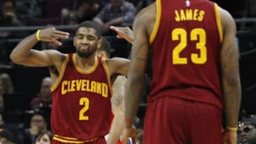 Jan 27, 2015; Auburn Hills, MI, USA; Cleveland Cavaliers guard Kyrie Irving (2) celebrates with forward LeBron James (23) after making a shot during the fourth quarter against the Detroit Pistons at The Palace of Auburn Hills. Cavs beat the Pistons 103-95. Mandatory Credit: Raj Mehta-USA TODAY Sports