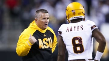Nov 19, 2016; Seattle, WA, USA; Arizona State Sun Devils head coach Todd Graham speaks with one of his players during a third quarter timeout against the Washington Huskies at Husky Stadium. Mandatory Credit: Jennifer Buchanan-USA TODAY Sports