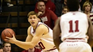 Feb 11, 2016; Bloomington, IN, USA; Indiana Hoosiers forward Collin Hartman (30) attempts to pass the ball to Indiana Hoosiers guard Yogi Ferrell (11) during the second period of the game at Assembly Hall. Indiana Hoosiers defeated the Iowa Hawkeyes 85 to 78. Mandatory Credit: Marc Lebryk-USA TODAY Sports