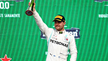 MEXICO CITY, MEXICO - OCTOBER 27: Third placed Valtteri Bottas of Finland and Mercedes GP celebrates on the podium during the F1 Grand Prix of Mexico at Autodromo Hermanos Rodriguez on October 27, 2019 in Mexico City, Mexico. (Photo by Mark Thompson/Getty Images)