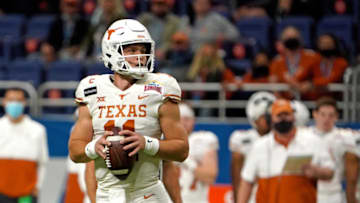 Dec 29, 2020; San Antonio, TX, USA; Texas Longhorns quarterback Sam Ehlinger (11) throws a pass against the Colorado Buffaloes during the first half at Alamodome. Mandatory Credit: Kirby Lee-USA TODAY Sports