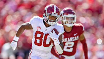 FAYETTEVILLE, ARKANSAS - OCTOBER 01: Kobe Prentice #80 of the Alabama Crimson Tide returns a pass for a touchdown in the first half of a game against the Arkansas Razorbacks at Donald W. Reynolds Razorback Stadium on October 01, 2022 in Fayetteville, Arkansas. (Photo by Wesley Hitt/Getty Images)