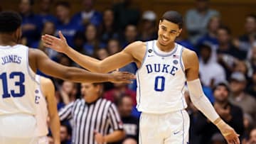 Jan 7, 2017; Durham, NC, USA; Duke Blue Devils forward Jayson Tatum (0) celebrates with guard Matt Jones (13) in the closing seconds of the second half of their game against the Boston College Eagles at Cameron Indoor Stadium. Mandatory Credit: Mark Dolejs-USA TODAY Sports