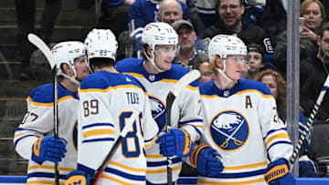 Apr 12, 2022; Toronto, Ontario, CAN; Buffalo Sabres forward Tage Thompson (72) celebrates with teammates after scoring a goal against the Toronto Maple Leafs in the second period at Scotiabank Arena. Mandatory Credit: Dan Hamilton-USA TODAY Sports