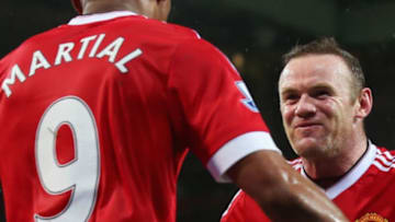 MANCHESTER, ENGLAND - JANUARY 02: Wayne Rooney (R) of Manchester United celebrates scoring his team's second goal with his team mate Anthony Martial (L) during the Barclays Premier League match between Manchester United and Swansea City at Old Trafford on January 2, 2016 in Manchester, England. (Photo by Alex Livesey/Getty Images)
