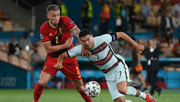 Belgium's defender Toby Alderweireld vies with Portugal's forward Cristiano Ronaldo during the UEFA EURO 2020 round of 16 football match between Belgium and Portugal at La Cartuja Stadium in Seville on June 27, 2021. (Photo by LLUIS GENE / POOL / AFP) (Photo by LLUIS GENE/POOL/AFP via Getty Images)