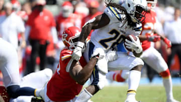 CARSON, CA - SEPTEMBER 09: Melvin Gordon #28 of the Los Angeles Chargers gets tackled by Chris Jones #95 of the Kansas City Chiefs during the second quarter at StubHub Center on September 9, 2018 in Carson, California. (Photo by Harry How/Getty Images)