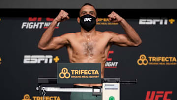 LAS VEGAS, NEVADA - DECEMBER 18: In this handout image provided by UFC, Rob Font poses on the scale during the UFC Fight Night weigh-in at UFC APEX on December 18, 2020 in Las Vegas, Nevada. (Photo by Cooper Neill/Zuffa LLC via Getty Images)