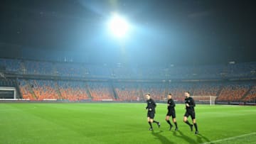 Fifa referees warm up ahead of the Egyptian league match between Al-Ahly and Zamalek at the Cairo International Stadium in the Egyptian capital on February 24, 2020. (Photo by Tarek IBRAHIM / AFP) (Photo by TAREK IBRAHIM/AFP via Getty Images)