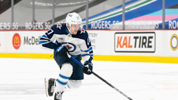 VANCOUVER, BC - MARCH 22: Nikolaj Ehlers #27 of the Winnipeg Jets skates with the puck during NHL action against the Vancouver Canucks at Rogers Arena on March 22, 2021 in Vancouver, Canada. (Photo by Rich Lam/Getty Images)