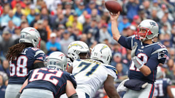 FOXBOROUGH, MA - OCTOBER 29: New England Patriots quarterback Tom Brady throws a pass with defensive pressure from the Los Angeles Chargers during second quarter action at Gillette Stadium in Foxborough, Mass., on Oct. 29, 2017. (Photo by Matthew J. Lee/The Boston Globe via Getty Images)