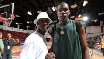 LAS VEGAS - JULY 15: Kevin Durant #35 of the Seattle Supersonics poses with Gary Payton after the game against the Portland Trail Blazers during the NBA Summer League on July 15, 2007 at the Cox Pavilion in Las Vegas, Nevada. NOTE TO USER: User expressly acknowledges and agrees that, by downloading and or using this photograph, User is consenting to the terms and conditions of the Getty Images License Agreement. Mandatory Copyright Notice: Copyright 2007 NBAE (Photo by Andrew D. Bernstein/NBAE via Getty Images)