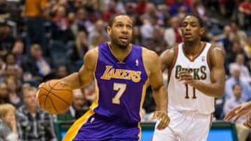Mar 27, 2014; Milwaukee, WI, USA; Los Angeles Lakers forward Xavier Henry (7) during the game against the Milwaukee Bucks at BMO Harris Bradley Center. Milwaukee won 108-105. Mandatory Credit: Jeff Hanisch-USA TODAY Sports
