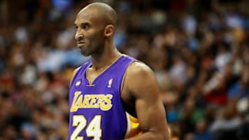 Feb 25, 2013; Denver, CO, USA; Los Angeles Lakers guard Kobe Bryant (24) reacts during the second half against the Denver Nuggets at the Pepsi Center. The Nuggets won 119-108. Mandatory Credit: Chris Humphreys-USA TODAY Sports