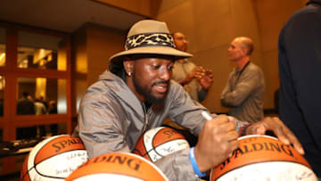 JOHANNESBURG, SOUTH AFRICA - AUGUST 1: Kemba Walker of the Charlotte Hornets signs balls during the Basketball Without Borders Africa program at the Hyatt Regency Hotel on August 1, 2017 in Gauteng province of Johannesburg, South Africa. NOTE TO USER: User expressly acknowledges and agrees that, by downloading and or using this photograph, User is consenting to the terms and conditions of the Getty Images License Agreement. Mandatory Copyright Notice: Copyright 2017 NBAE (Photo by Nathaniel S. Butler/NBAE via Getty Images)