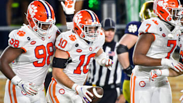 Nov 7, 2020; South Bend, Indiana, USA; Clemson Tigers linebacker Baylon Spector (10) celebrates after recovering a fumble in the end zone in the third quarter against the Notre Dame Fighting Irish at Notre Dame Stadium. Mandatory Credit: Matt Cashore-USA TODAY Sports
