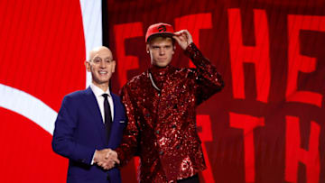 NEW YORK, NEW YORK - JUNE 22: Gradey Dick (R) poses with NBA commissioner Adam Silver (L) after being drafted 13th overall pick by the Toronto Raptors during the first round of the 2023 NBA Draft at Barclays Center on June 22, 2023 in the Brooklyn borough of New York City. NOTE TO USER: User expressly acknowledges and agrees that, by downloading and or using this photograph, User is consenting to the terms and conditions of the Getty Images License Agreement. (Photo by Sarah Stier/Getty Images)