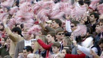 Nov 15, 2014; Tuscaloosa, AL, USA; Alabama Crimson Tide fans wave pom-poms in the second quarter against the Mississippi State Bulldogs at Bryant-Denny Stadium. Mandatory Credit: Marvin Gentry-USA TODAY Sports