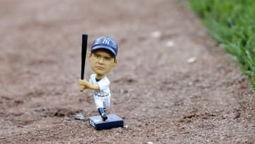 Sep 1, 2015; Boston, MA, USA; A bobble head doll of Babe Ruth on the field prior to a game between the Boston Red Sox and New York Yankees at Fenway Park. Mandatory Credit: Bob DeChiara-USA TODAY Sports